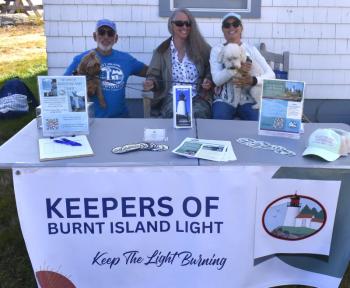 A few of the Keeper's of Burnt Island Light (KBIL) greeting and recruiting from left, Board President Doug Goldhirsch, Joann ? and Sharon Goldhirsch. LISA KRISTOFF/Boothbay Register