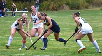 Seahawk junior Moriah Smith works her way past two Winthrop defenders in the second half of their Sept. 30 game. KEVIN BURNHAM/Boothbay Register
