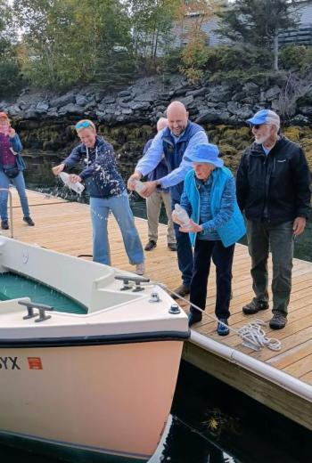 Christening one of the boats. Courtesy photo