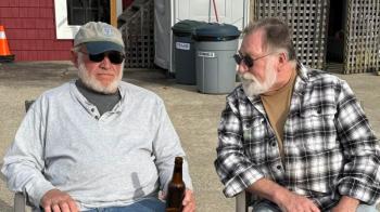 Clive Farrin, left, and Dennis Blackman relax during the party. Courtesy  photo