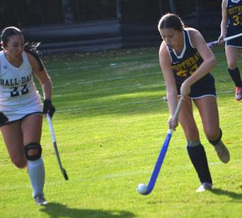 Meabh Hennessey carries the ball during the first half of Thursday's game. KEVIN BURNHAM/Boothbay Register