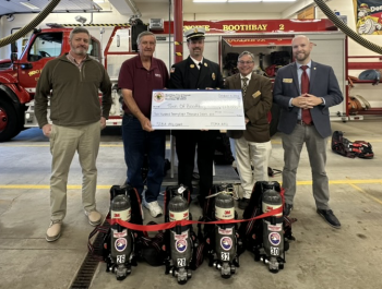 Pictured from left are Dan Bryer, Boothbay Town Manager, Ken Desmond, president, Maine State Federation of Firefighters, Boothbay Fire Chief Tim Pinkham, Chuck Mahaleris from Senator Collins' office and Scott Wilkinson from Senator King's office. Courtesy of Mark Sullivan