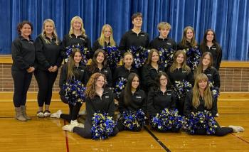 The 2026 Boothbay Region High School cheerleading team. Pictured from left are, front row: Bea Wormwood, Briella Green, Kaye Hallinan, Maya Jacobs; middle row: Ashlynn Andrews, Cali McDuff, Emma Doucette, Izzy Andreasen, Jessie Ullo, Hallie Arbogast; back row:  Coach Michele Ripley, Assistant Christian Jewett, Brianna Campbell, Olivia Rittal, Ronan Drage, Titan Lewis, Annie Whitney and Assistant Mady McLellan. ISABELLE CURTIS/Boothbay Register