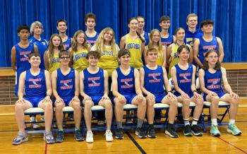 The 2026 Boothbay-Wiscasset girls and boys cross-country team. Pictured from left are, front row: Carson MacKusick, Mile Hyson, Ryder Campbell, James Barter, Jackson Zehm, John Cooper, Isaac Meyer; middle row: Louie Caidoc, Emma Scott, Polly Neadau, Addie Barter, Maggie McCarthy, Olivia Rittall, Audrey Robinson, Alex Ross; back row: Coach Nick Scott, AJ Crocker, Kolton McKenney, Brady Baldwin, Ben Gapski and Caleb Bates. Missing: Lexi Hughes, Coach Jake McCarthy and Coach John Pasch. ISABELLE CURTIS/Boothb