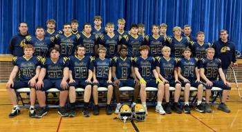 The 2026 Boothbay Region High School football team. Pictured from left are, front row: Valentine Rathgeb, Byran Hills, Jason Main, Curtis Spoford, Aron Geddes, Isaac Fanslau, Ben C. Hodgdon, Will Lassen, Jayden Orne; middle row: Eben Robinson, Silas Kaler, Haiden Blackman, Peyton Barter, Ford Harris, Miles Murray, Chris Lincoln, Colby Doucette, Coach Jason Michael; back row: Coach Ed Crocker, Chase Licursi, Thomas Hennessey, Aiden Locke, Ben Hodgdon, Matt Reed, Aiden Jewett and Coach Adam Smart. Missing: Ro