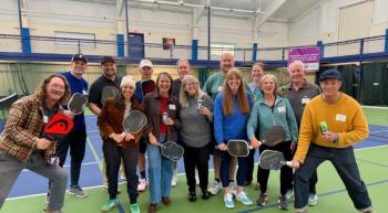 Participants in the Y’s Business Partners thank-you event with seasonal Southport residents and Dogfish Head brewery co-founders Mariah and Sam Calagione. Courtesy of BRYMCA