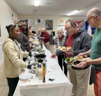 Getting served at the Christmas dinner. Courtesy of Barb House
