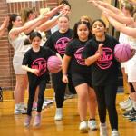 Lady Dribblers enter the gym under the arms of the Lady Seahawks. KEVIN BURNHAM/Boothbay Register