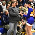 Skyla Carrier presents a carnation to her mother, Shannon Leeman, at the BRHS senior celebration Feb. 3. FRITZ FREUDENBERGER/Boothbay Register