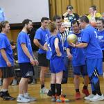 Ed Crocker holds the gold ball as the winning blue team looks on. KEVIN BURNHAM/Boothbay Register