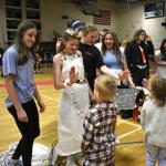 Polly Nadeau-Miller and her team interact with a young voter at BRES's 2nd annual Trashion Show. ISABELLE CURTIS/Boothbay Register