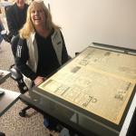 Sarah Morley and Larry Brown take a turn scanning a historical Boothbay Register on the Maine State Library's state-of-the-art machine. KEVIN BURNHAM/Boothbay Register