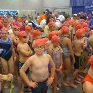 Adam Sirois stands in the forefront as his group prepares for the swim event. Courtesy of Russell Sirois