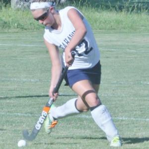 Tori Schmid, a junior on the Lady Seahawks field hockey team, dribbles the ball up-field. KEVIN BURNHAM/Boothbay Register
