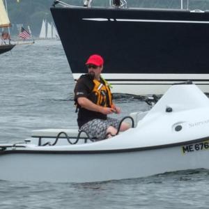 George Welton operations manager at Hodgdon Yachts' Defense Composites in Bath, operates a Greenough Advanced Rescue Craft (GARC) during Saturday's race.  JOHN EDWARDS/Boothbay Register