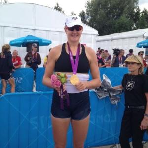 Ellie Logan proudly displays her gold medal. Courtesy of Jaimie Logan