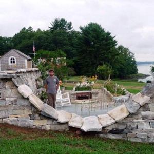 Master Stonemason Chris Tanguay in the sunken garden he created at the home of Louanna and Ted Frois on Westport Island the site of this year’s Champagne on the Sheepscot. Below, Sheepscot Valley Conservation Association staff and volunteers Kristin Pennock, Ann Springhorn, Honor Sage, Suki Flanagan, Carole Dunbar, Nancy Hartley, Callie Wronker and Beth Quivey prepare fundraiser invitations. Master Stonemason Chris Tanguay in the sunken garden he created at the home of Louanna and Ted Frois on Westport Island the site of this year’s Champagne on the Sheepscot.