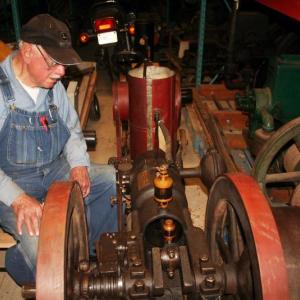 Robert Meixell, a collector of antique farm engines and co-founder of the Maine Antique Power Association, restores engines from his Westport Island homestead. Below, Meixell's workshop is a maze of antique engines once used to operate well pumps and other farm machinery. JOHN MAGUIRE/Wiscasset Newspaper JOHN MAGUIRE/Wiscasset Newspaper Robert Meixell, a collector of antique farm engines and co-founder of the Maine Antique Power Association, restores engines from his Westport Island homestead. JOHN MAGUIRE/Wiscasset Newspaper