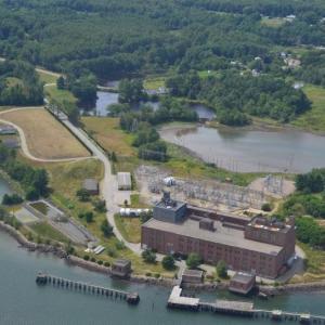 Mason Station, the former steam-electric generating plant that once housed five turbo generators and a maze of equipment that produced needed electricity during World War II, sits idle on the shores of the Sheepscot River with its interior being dismantled and shipped to Guatemala. Photo Courtesy of Karl Marean 