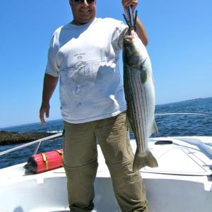 Steve Paternite with a 38-inch, 25-pound striper. Steve Paternite with a 38-inch, 25-pound striper, boothbay, boothbay harbor