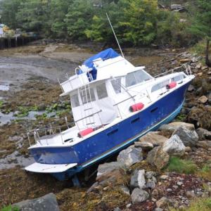 The "Otra Vez" washed up on the rocks in Mill Cove. BEN BULKELEY/Boothbay Register