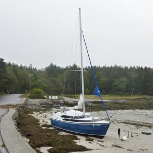 Gene Eves' sailboat on Hendricks Head beach on Southport after the September 19 storm washed it ashore. Courtesy of Gene Eves Gene Eves' sailboat on Hendricks Head beach on Southport after the September 19 storm washed it ashore. Courtesy of Gene Eves