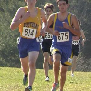  Alex Owen runs the last race of his cross-country career at BRHS. Owen met his goal for this season, to break 18:00 minutes in a 3.1 mile course. He ran the race 17:56. RYAN LEIGHTON/Boothbay Register