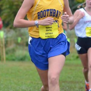 Hannah Morley closes in on the finish line, earning seventh place overall in the freshmen girls division with a time of 22:08. Courtesy of Aquilino Alamo