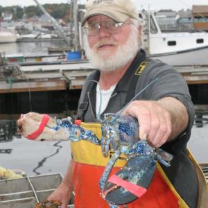 Clive Farrin and his catch. KEVIN BURNHAM/Boothbay Register Clive Farrin and his catch. KEVIN BURNHAM/Boothbay Register