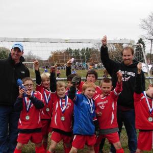 The Midcoast U9 soccer team ends its season at the North Central Soccer Festival in Waterville October 21. The team includes, front row, left to right, Garrett Cossette, Nathaniel Jewett, Andrew Gudroe, Gavin Loupe and Aiden Foley; back row, left to right,  Coach Paul Foley, Jack Duncan, Maddox Tilas, Eric Drappeau and  Assisstant Coach Darrell Gudroe.