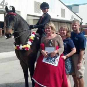 Boothbay's Hali Goodwin after her win on CBMF Off The Charts. Also pictured are, from front, trainer Katie Yereance and Goodwin's parents, Amy and Dusty Goodwin. Courtesy of Amy Goodwin Boothbay's Hali Goodwin after her win on CBMF Off The Charts. Also pictured are, from front, trainer Katie Yereance and Goodwin's parents, Amy and Dusty Goodwin. Courtesy of Amy Goodwin