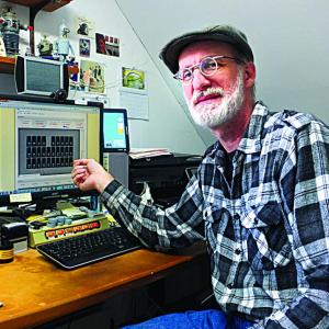 Guy Marsden can monitor how much energy his home uses and how much his family saves by using available sunlight. JOHN MAGUIRE/Wiscasset Newspaper Guy Marsden can monitor how much energy his home uses and how much his family saves by using available sunlight. JOHN MAGUIRE/Wiscasset Newspaper