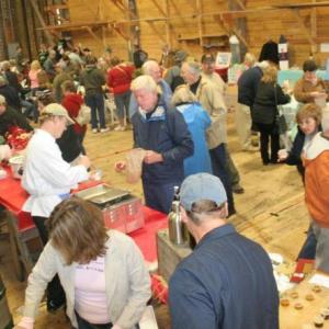 The massive boat shed at Boothbay Harbor Shipyard provide plenty of room for the 350-plus attendees at Harbor Fest's Chowder and Chili Challenge. Clockwise: Kelly Flynn, left, and Holly Stover dish out Brown's Wharf first-place chili, made by Micah Jones. Craig Andrews, owner/operator of Andrews' Harborside Restaurant, gets ready for the Chowder and Chili Challenge. KEVIN BURNHAM/Boothbay Register See Photo Gallery for more photos The massive boat shed at Boothbay Harbor Shipyard provide plenty of room for the 350-plus attendees at Harbor Fest's Chowder and Chili Challenge.