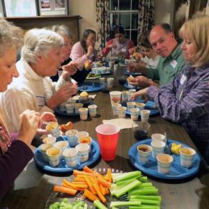 Volunteers try to pick their favorite chili at the annual volunteer appreciation celebration. Courtesy of Sheepscot Valley Conservation Association