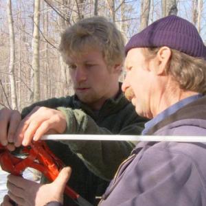 Rob Johanson and his son Carl prepare for the maple syrup season. “An Uncertain Harvest” highlights the Goranson family farm in 2009. The film screened November 25 at the Harbor Theatre. Courtesy of Bill Kunitz