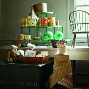 The Marston House includes finds from all over the world: a painted French garden stand; an 18th century child-size English chair; witches balls from Brimfield, Mass; pottery pitchers from France; and rolls of 1850s espadrille fabric.