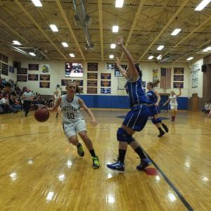 Freshman guard Hannah Morley handles the ball with precision, as she drives down the lane. RYAN LEIGHTON/Boothbay Register 