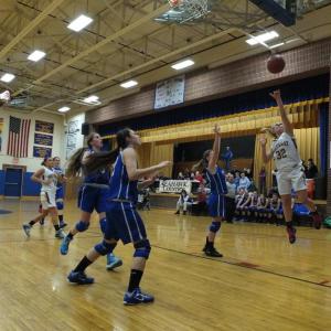 Morgan Crocker puts up her patented lefthand layup.  RYAN LEIGHTON/Boothbay Register  