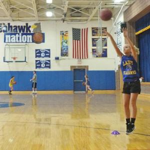 Sophomore Sarah Durgan puts up a long jump shot at practice. RYAN LEIGHTON/Boothbay Register