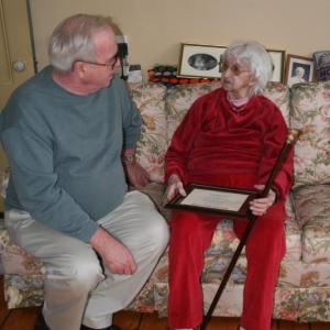 Evelyn Hartung Keene being presented with the Boston Post Cane on December 10 of 2007, talking with then-chairman of the Boothbay Harbor Board of Selectmen, Louis Burnham. KEVIN BURNHAM/Boothbay Register