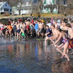 44 hardy souls greet 2012 with a quick, cold dip into Linekin Bay January 1 to raise funds for the YMCA's second grade swim program. The annual fundraiser drew record numbers of plungers and well-wishers to the Murray Hill boat launch on a beautiful, unseasonably warm New Year’s Day. SUE MELLO/Boothbay Register 44 hardy souls greet 2012 with a quick, cold dip into Linekin Bay January 1 to raise funds for the YMCA's second grade swim program. The annual fundraiser drew record numbers of plungers and well-wishers to the Murray Hill boat launch on a beautiful, unseasonably warm New Year’s Day. SUE MELLO/Boothbay Register