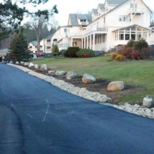The final repaving work being completed at Spruce Point Inn. courtesy of Angelo DiGiulian The final repaving work being completed at Spruce Point Inn. courtesy of Angelo DiGiulian