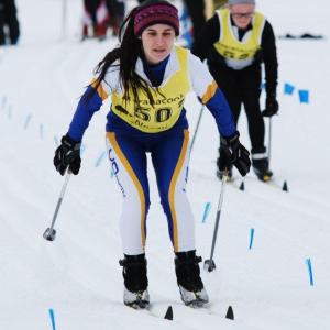 Junior Sophia Thayer cruises to the finish line in this photo from last season. Thayer, who has consistently been a top high school cross country runner for the state, is expected to lead the Seahawk girls Nordic team this season. Courtesy of Aquilino Alamo