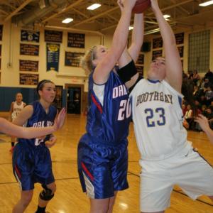 Allison Crocker battles Oak Hill's Brianna Hodgkins for a second half rebound. KEVIN BURNHAM/Boothbay Register