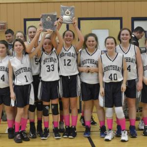 The BRES Wildcat seventh grade girls team celebrates its championship. Courtesy of Ron Hawkes