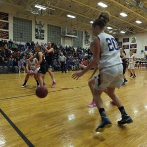 Alex Clarke fires a pass to Hannah Morley under the basket during Friday's game against Hall-Dale. Alex Clarke fires a pass to Hannah Morley under the basket during Friday's game against Hall-Dale.