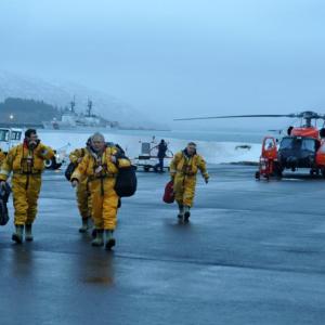 Kulluk's crew members Air Station Kodiak following a Coast Guard rescue and a ride in an MH-60 Jayhawk helicopter. Photo courtesy of Petty Officer 3rd Class Jonathan Klingenberg. Below: The Kulluk grounded near Sitkalidak Island, Alaska. U.S. Coast Guard photo courtesy of Petty Officer 2nd Class Zachary Painter. Kulluk's crew members Air Station Kodiak following a Coast Guard rescue and a ride in an MH-60 Jayhawk helicopter. Photo courtesy of Petty Officer 3rd Class Jonathan Klingenberg