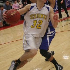 Anthony DiMauro gets a step on Madison's Derek LeBlanc on a drive to the hoop. KEVIN BURNHAM/Boothbay Register
