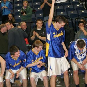 Sophomore John Hepburn holds up the Harry Edwards award after being named the outstanding player of the tournament. KEVIN BURNHAM/Boothbay Register 