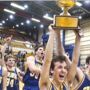Seahawks co-captains Ian McConnell and Bob Deetjen raise the gold ball high as the 2001 Seahawks champions celebrate their state title at the Bangor Auditorium. Seahawks co-captains Ian McConnell and Bob Deetjen raise the gold ball high as the 2001 Seahawks champions celebrate their state title at the Bangor Auditorium.